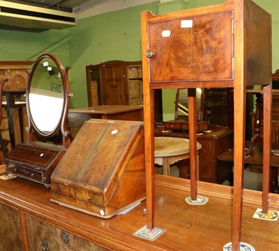 Lot 1256 - A tray-top bedside table; a 19th century inlaid mahogany toilet mirror; and a burr oak desktop...