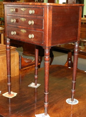 Lot 1257 - An early 19th century mahogany three drawer work table