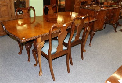 Lot 1263 - Reproduction burr walnut dining suite comprising dining table, four chairs and a sideboard