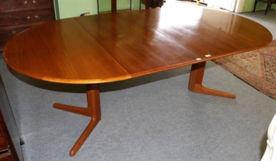 Lot 1278 - A 1970s Danish teak dining table, with two leaves in original packaging