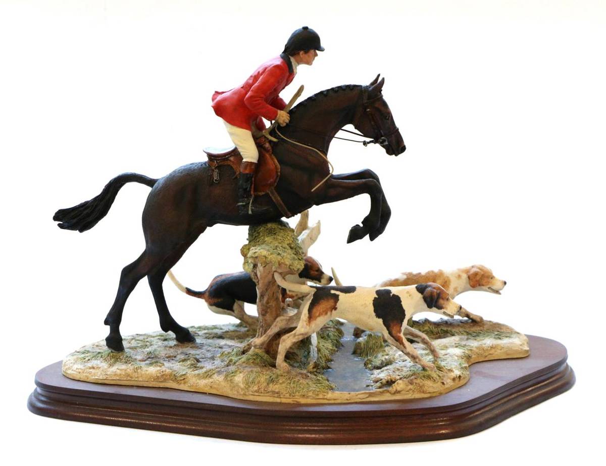 Lot 41 - Border Fine Arts 'Halloa Away' (Jumping Huntsman and three Hounds), model No. L104 by Anne...