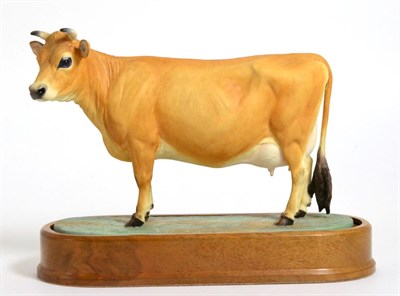 Lot 142 - Royal Worcester Jersey Cow ";Bramley Zenora";, model No. RW3689 by Doris Lindner, on wooden plinth