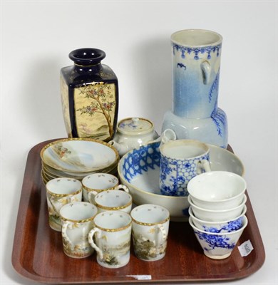 Lot 152 - Japanese blue and white vase, bowl, six egg shell cups and saucers, wine pot and four bowls,...