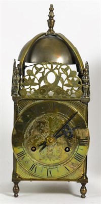Lot 155 - A brass lantern clock