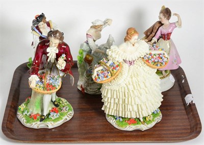 Lot 161 - Two pairs of modern Sitzendorf porcelain figures and another Capodimonte style example (5)