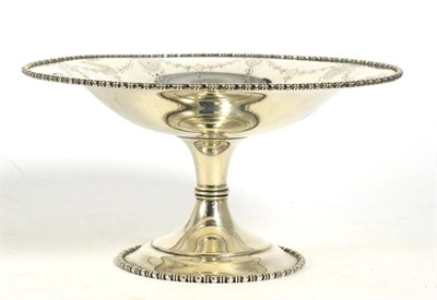 Lot 191 - A silver pedestal bowl or comport, Manoah Rhodes, London 1911, engraved with bell flower swags,...