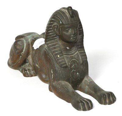 Lot 207 - A Regency bronze sphinx