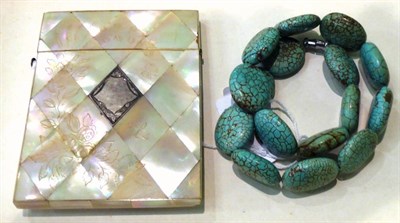 Lot 218 - A mother-of-pearl card case and a simulated turquoise necklace