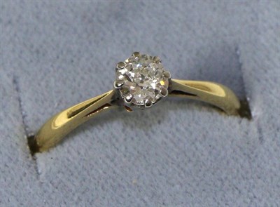 Lot 265 - A solitaire diamond ring, an old cut diamond in a claw setting, to knife edge shoulders,...