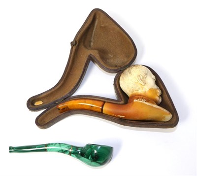 Lot 266 - A cased Meerschaum style pipe, Lord Kitchener (a.f.); together with a malachite pipe (2)