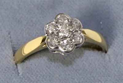 Lot 270 - An 18 carat gold diamond cluster ring, total estimated diamond weight 0.55 carat approximately,...