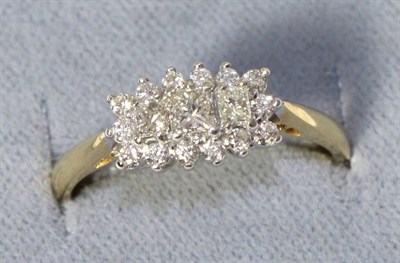 Lot 278 - An 18 carat gold princess cut diamond cluster ring, total estimated diamond weight 0.60 carat...