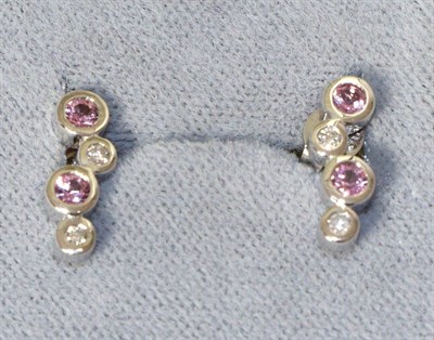 Lot 279 - A Pair of 18 carat white gold pink sapphire and diamond earrings, a bar of two round cut pink...