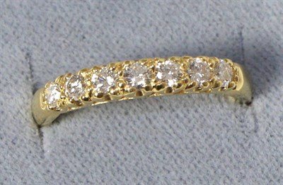 Lot 285 - An 18 carat gold diamond half hoop ring, total estimated diamond weight 0.45 carat...