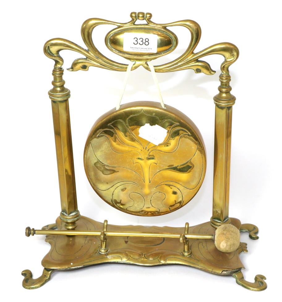Lot 338 - An Art Nouveau brass table gong