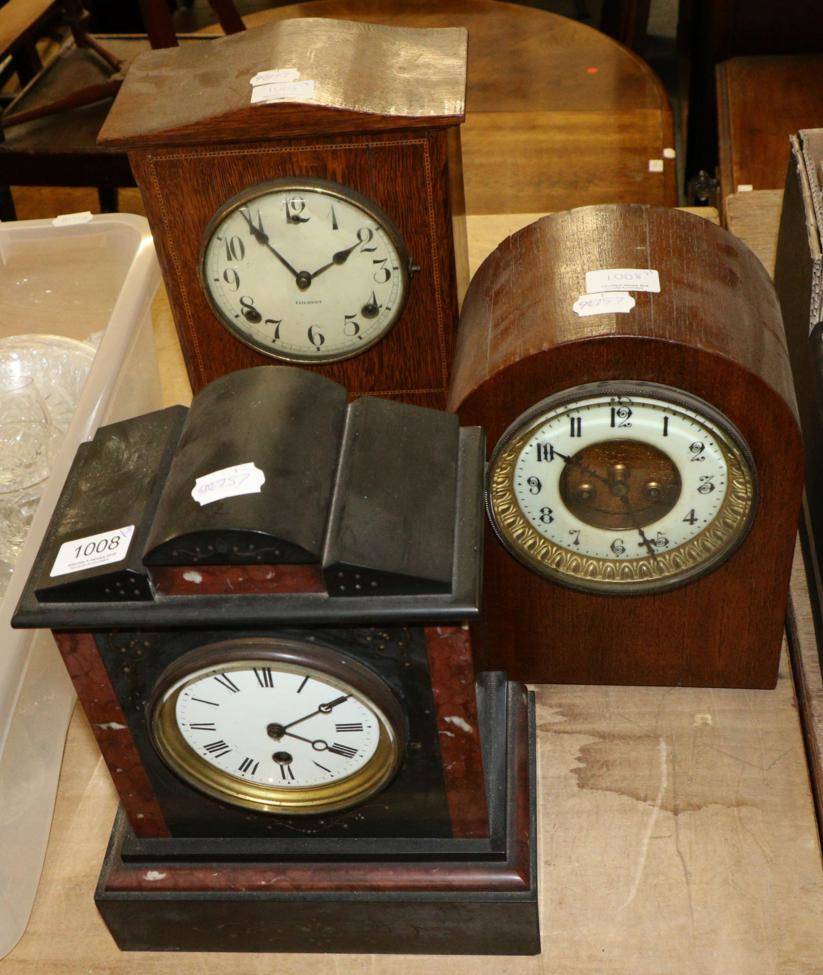 Lot 1008 - A Victorian black slate and red marble mantel timepiece and two striking mantel clocks