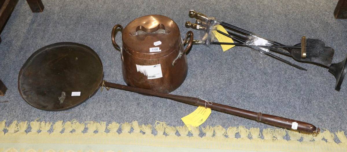 Lot 1108 - A 19th century copper twin handled log bin, long handled pan of similar date and a companion set