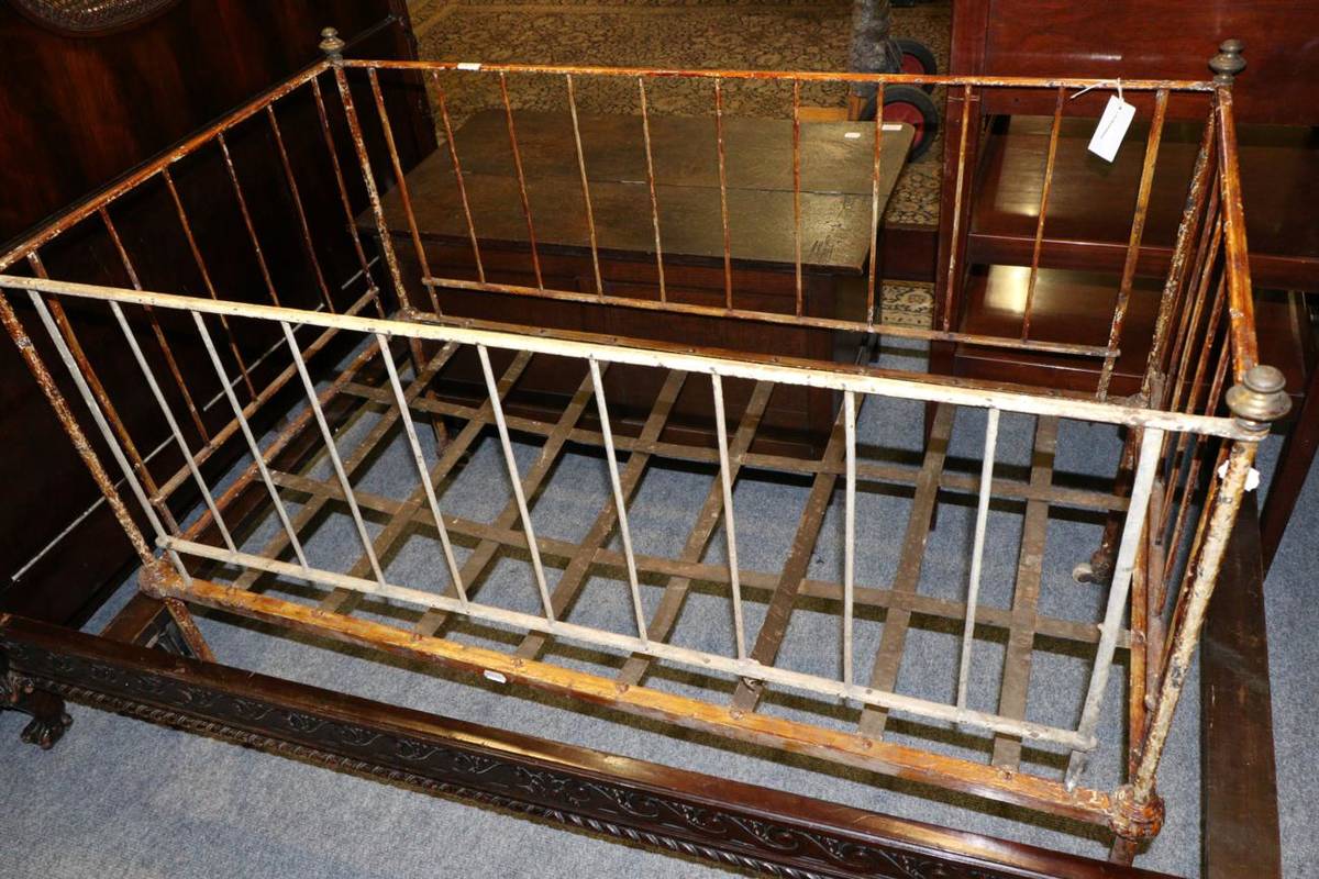 Lot 1133 - A 19th century painted metal crib
