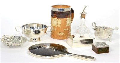 Lot 4 - A silver mounted Doulton mug; a tortoiseshell mirror; a cigarette box; a shell butter dish; a...