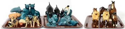 Lot 7 - Poole pottery animals including a set of three graduated dolphins, together with a Beswick...