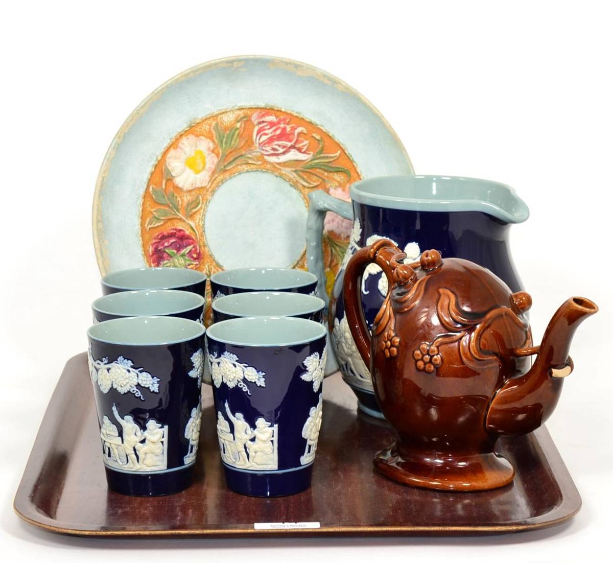 Lot 14 - A treacle glazed Cadogan teapot; a Copeland Spode jug and six beakers and a Linthorpe pottery,...