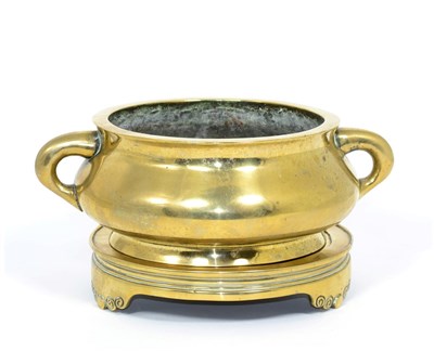 Lot 18 - A Chinese bronze censor and stand