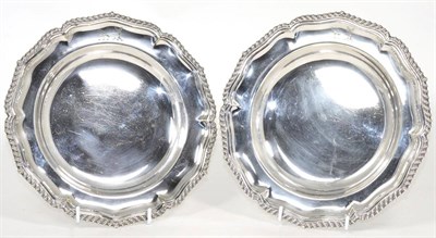 Lot 30 - A pair of Victorian electroplated soup plates of George III style, circular shaped with gadroon...