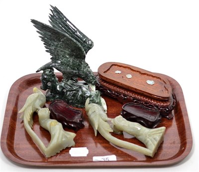 Lot 35 - Three modern Chinese jade carvings of birds on stands