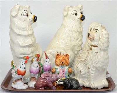Lot 53 - Two pairs of pottery Staffordshire seated spaniels, a hardstone model of a hare, a Beswick...