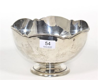 Lot 54 - A silver pedestal bowl with shaped rim, Charles Edwards, London 1913, with presentation inscription