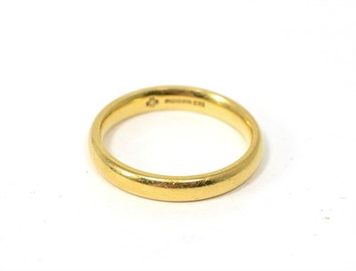 Lot 75 - An 18 carat gold band ring, finger size N