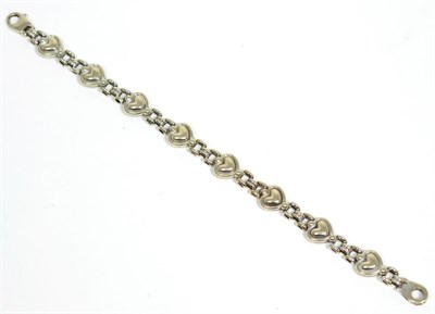 Lot 85 - A 9 carat white gold bracelet, formed of heart-shaped and gate pattern links, length 20cm