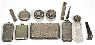 Lot 87 - A silver double sovereign/vesta holder; a silver cigarette case; silver vesta etc