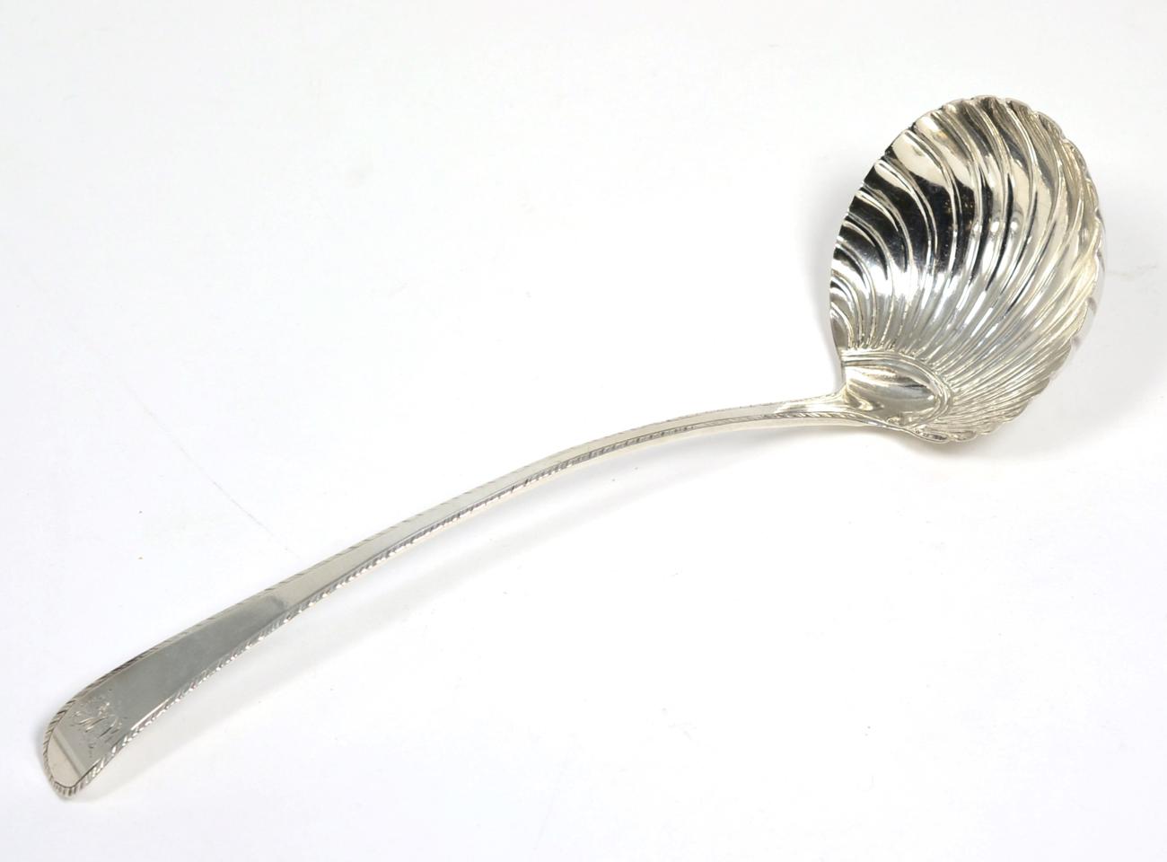 Lot 88 - An 18th century silver soup ladle, marks indistinct, London, maker's mark possibly Robert Ross...
