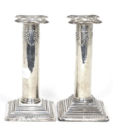 Lot 93 - A pair of silver candlesticks, Birmingham, weighted bases (a.f.) (2)