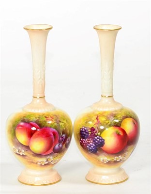 Lot 100 - A pair of Royal Worcester fruit painted vases, signed E Townsend