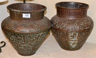 Lot 125 - A pair of Islamic copper vases