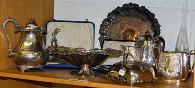 Lot 135 - Plated wares including a three piece tea service, a teapot, a cake basket etc