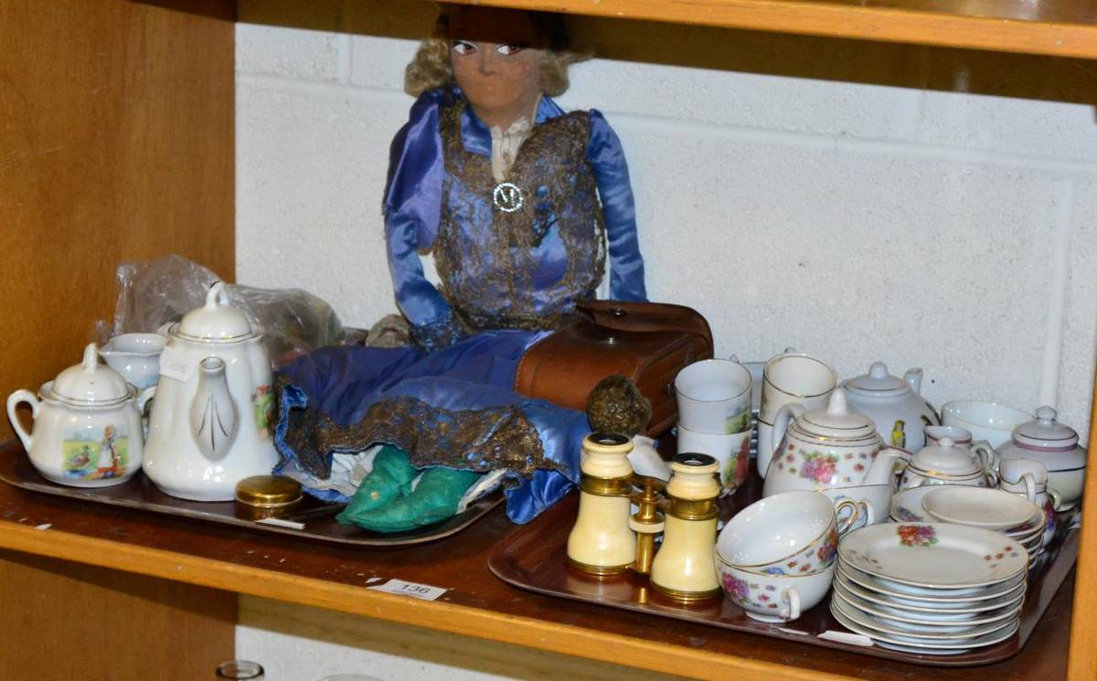 Lot 136 - A 1920's boudoir doll labelled 'Charlier Paris'; various miniature dolls; a pair of ivory opera...