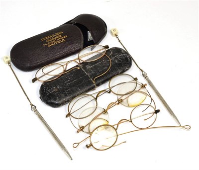 Lot 159 - Three pairs of gold coloured metal framed spectacles, one pair stamped with makers mark RG to...