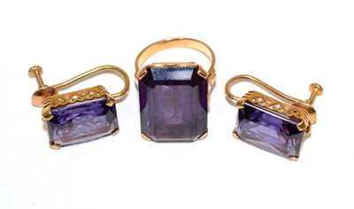 Lot 169 - A synthetic colour change sapphire ring and earring suite; octagonal cut synthetic colour...