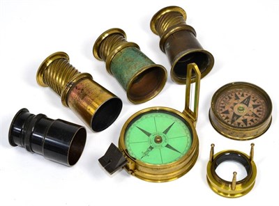 Lot 184 - A brass pocket compass, marked 'Elliott Bros, Strand London'; a smaller brass pocket compass;...
