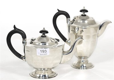 Lot 193 - A silver tea pot and hot water jug, Viners Ltd, Sheffield 1931, the hot water jug 20cm high (2)