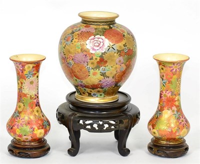 Lot 208 - A Satsuma vase, of ovoid form and a pair of Satsuma vases on bases