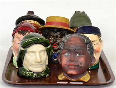 Lot 216 - A group of seven novelty ceramic tobacco jars and covers, modelled as heads of a lifeboatman,...