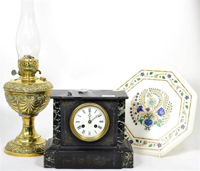 Lot 220 - A Victorian black slate mantel clock; a brass oil lamp with anthemion decoration; and an Indian...