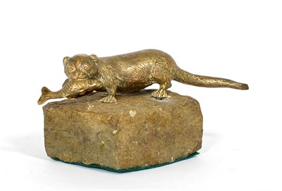 Lot 249 - A bronze figure of an otter, on a stone base