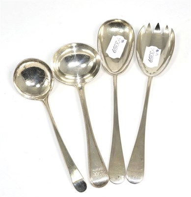 Lot 266 - A pair of silver salad servers; a Victorian bead edge sauce ladle; and a George III sauce ladle