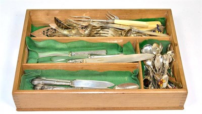 Lot 283 - A quantity of souvenir silver teaspoons; various silver handled butter knives; and a quantity...