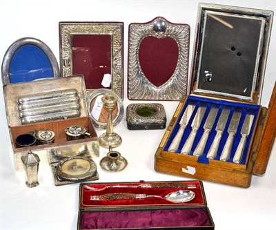 Lot 294 - Silver items to include a cigarette box; condiments; pocket watch stand; miniature...